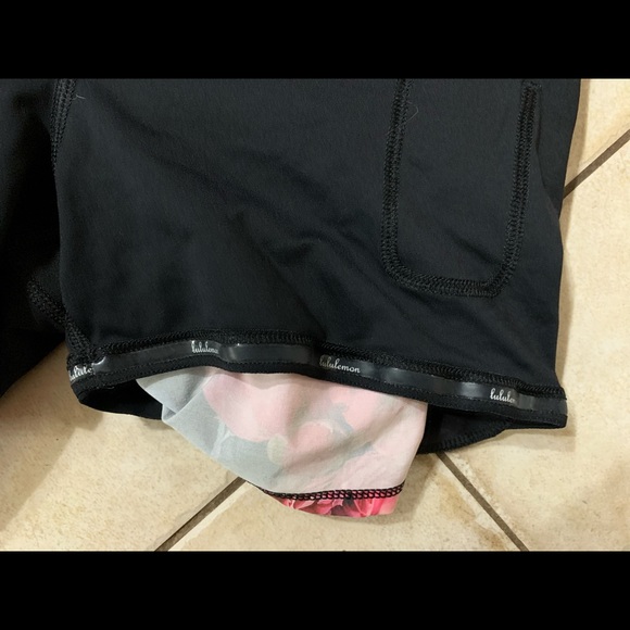 Lululemon floral shorts with built in tight black shorts. Ladies size 4. EUC - Picture 13 of 13